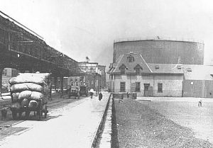 The Molasses silo, towering above the railway before the collapse